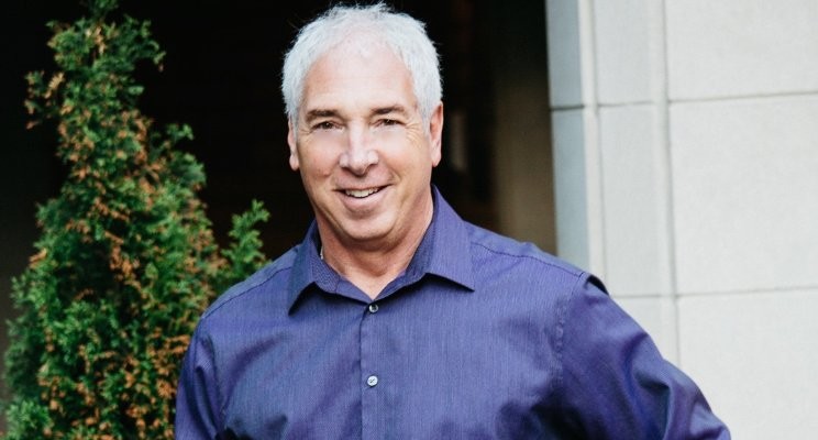 profile picture of success coach Michael Vukelic in purple shirt