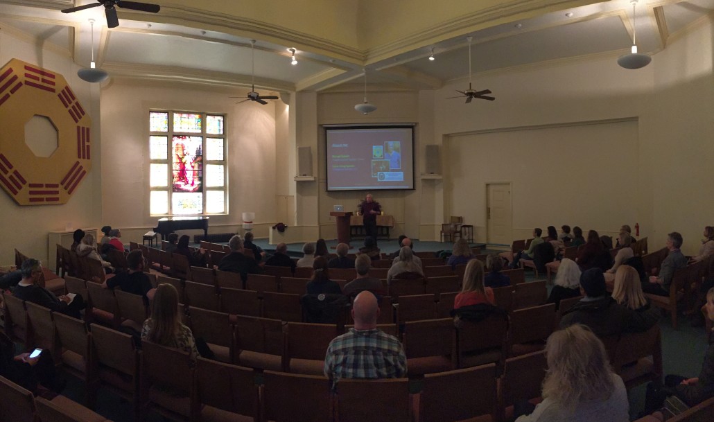 Picture of Michael Vukelic Speaking to Lake Harriet Audience